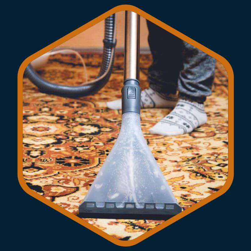 Professional technician from Kairos Upholstery cleaning a Persian rug in Bryanston.