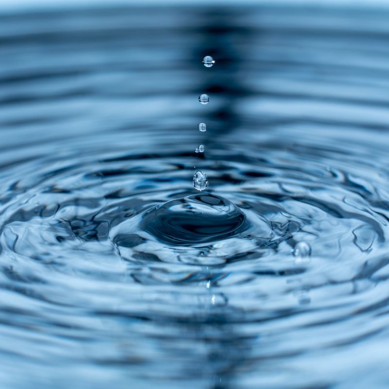 Water droplets symbolizing flood damage, representing Kairos Upholstery's expert flood damage restoration services in Pretoria.